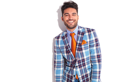 Casual man in plaid jacket and orange tie_105611212_XS
