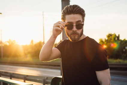 Young beautiful man on the street at the sunset_159843406_XS