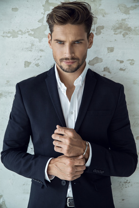 Portrait of sexy man in black suit_118123707_XS